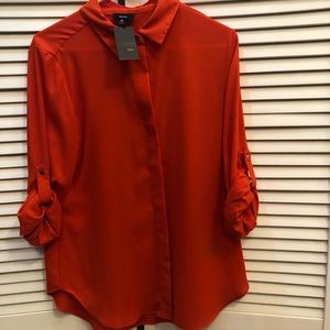 Orange red button down shirt
